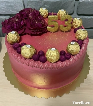 Tort z żywymi kwiatami, jadalnym brokatem, ferrero roche i borówkami